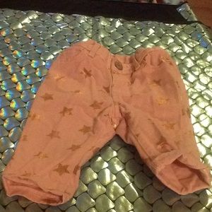 Peach pants with gold stars